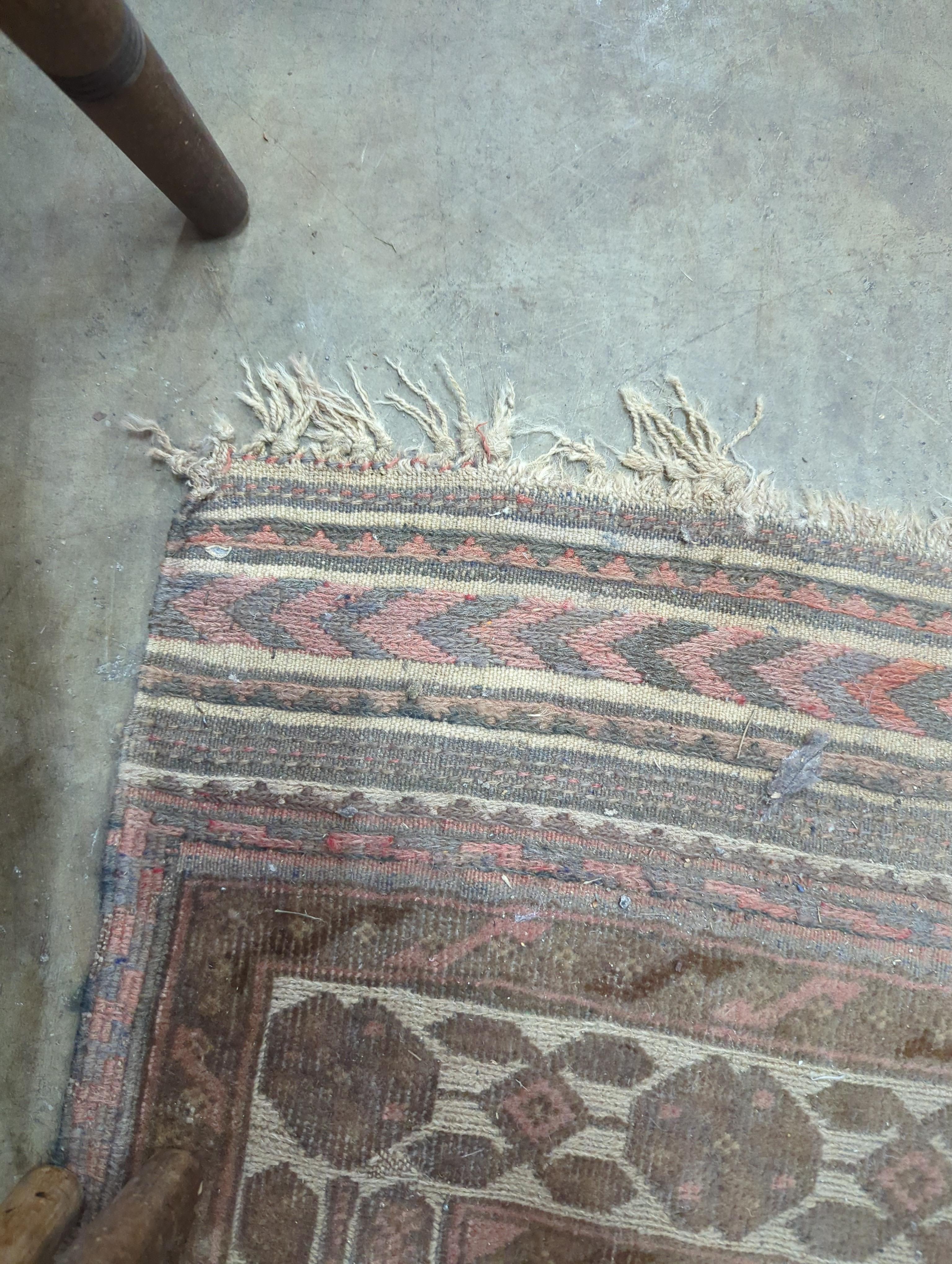 An ivory ground Afghan runner, 370 x 93cm